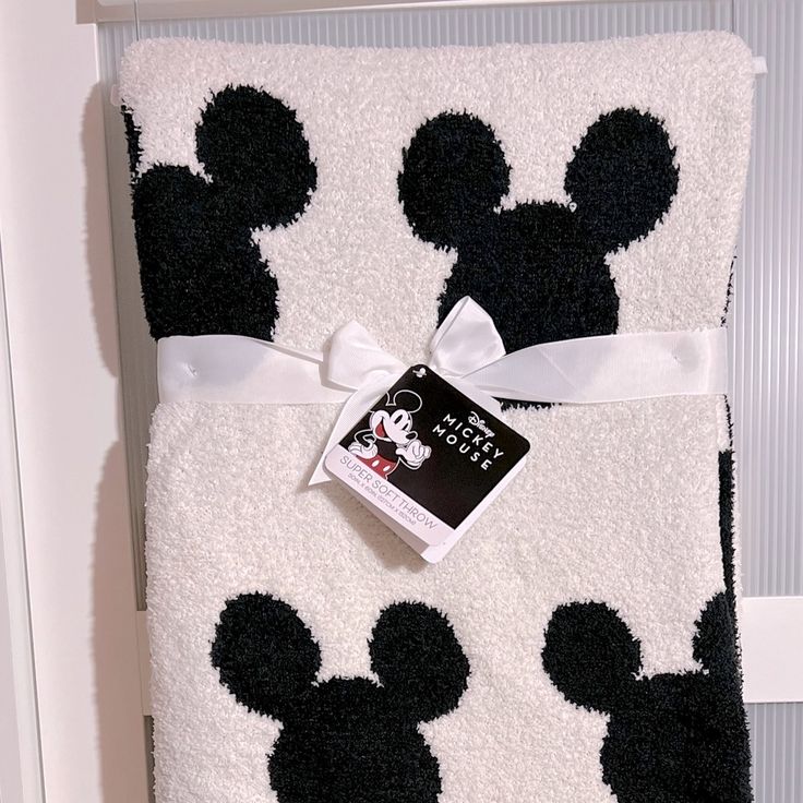 a towel with black and white mickey mouses on it