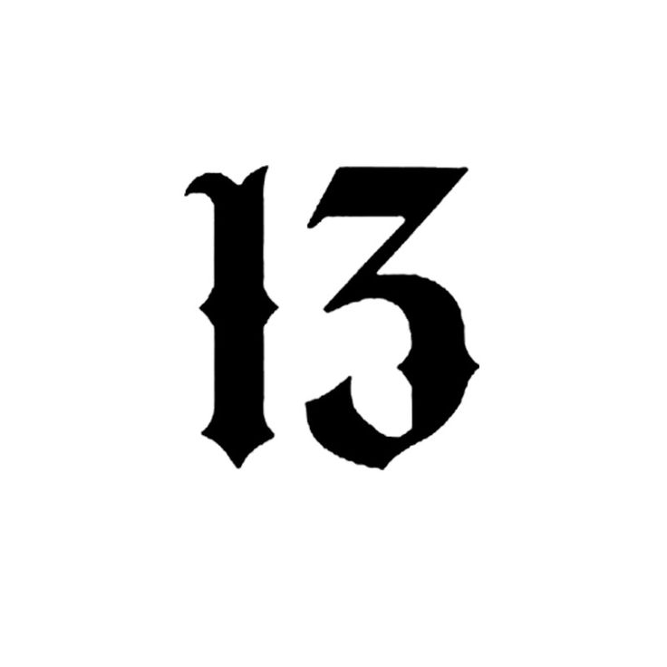 the number thirteen is shown in black and white