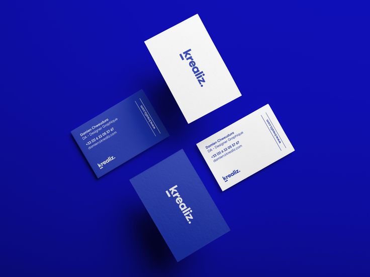 three business cards sitting on top of each other in front of a blue background with the words kreme