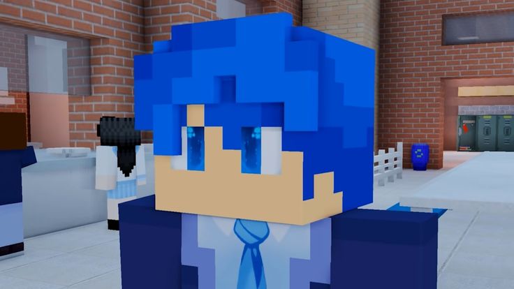 an animated image of a man with blue hair in front of a brick wall and building