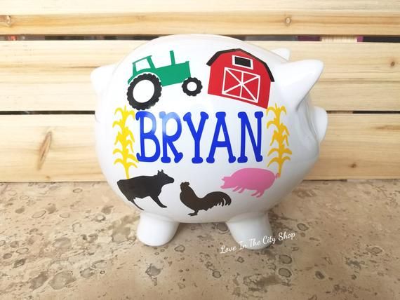 a piggy bank with farm animals painted on it's side and the words, ryan