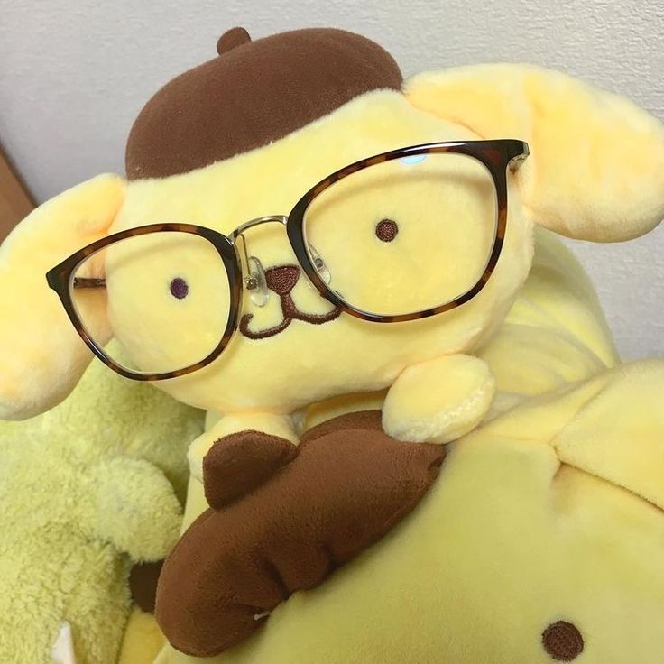 a stuffed animal with glasses on it's face