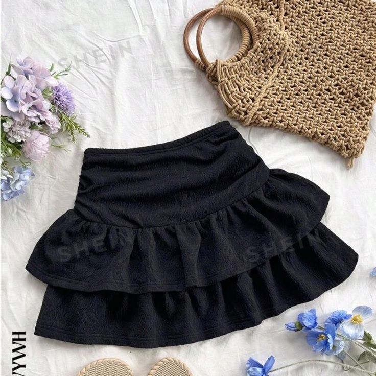 Black Never Worn Summer High Waist Black Mini Skirt, Black Skirted Bottoms, Trendy Black Skirted Skort, Black Casual Mini Skirt For Summer, Black High Waist Skirt For Summer, Black Casual Summer Skirt, Casual Black Summer Skirt, Black Stretch Ruffle Skort, Black Solid Color Mini Skirt