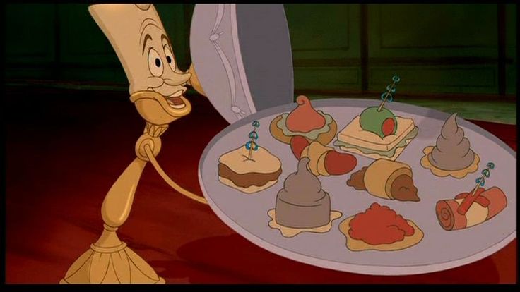 a cartoon character holding a plate with desserts on it