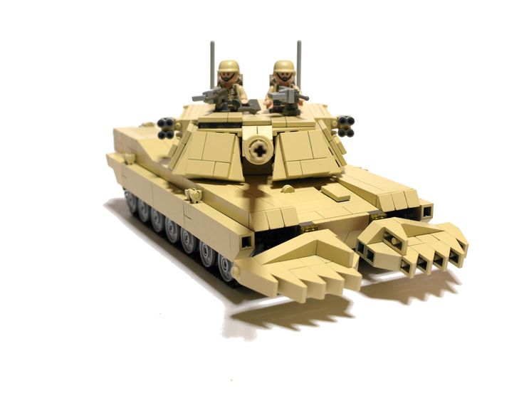 a lego army tank with two soldiers on the top and one in the back,