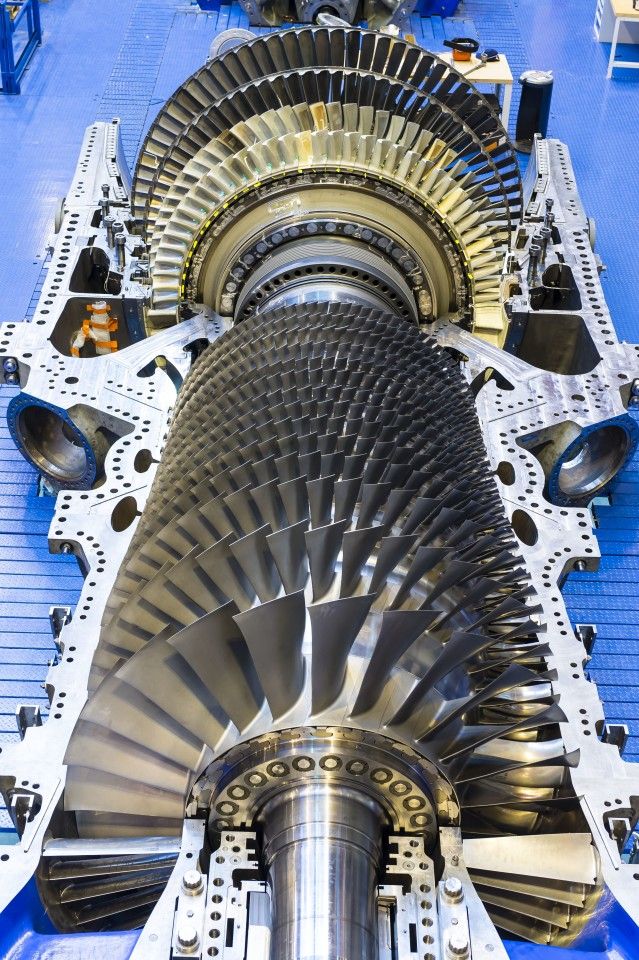 the inside of a large machine with many gears