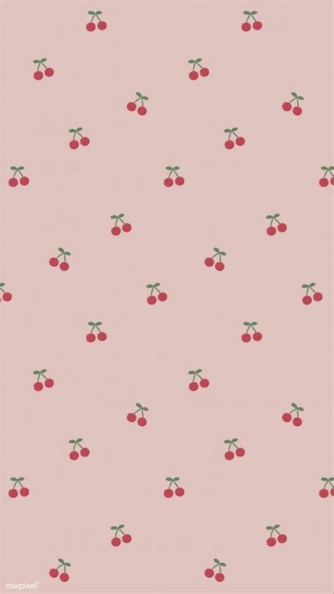 a pink background with cherries on it