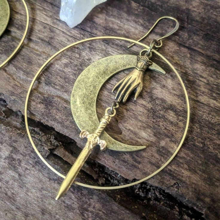 Hand Sword Crescent Earrings, Moon Power Knife Earrings, Gold Victorian Dagger Earrings, Femme Fatale Small War Dangerous Cute Blade Earring - Froppin Handmade Metal Fantasy Earrings, Handmade Fantasy Metal Earrings, Knife Earrings, Dagger Earrings, Earrings Moon, Crescent Earrings, Professional Jewelry, Beads And Wire, Elegant Earrings