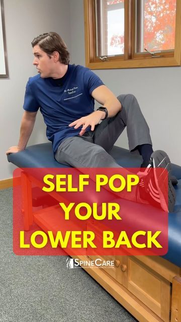 a man sitting on top of a bed with the words self pop your lower back