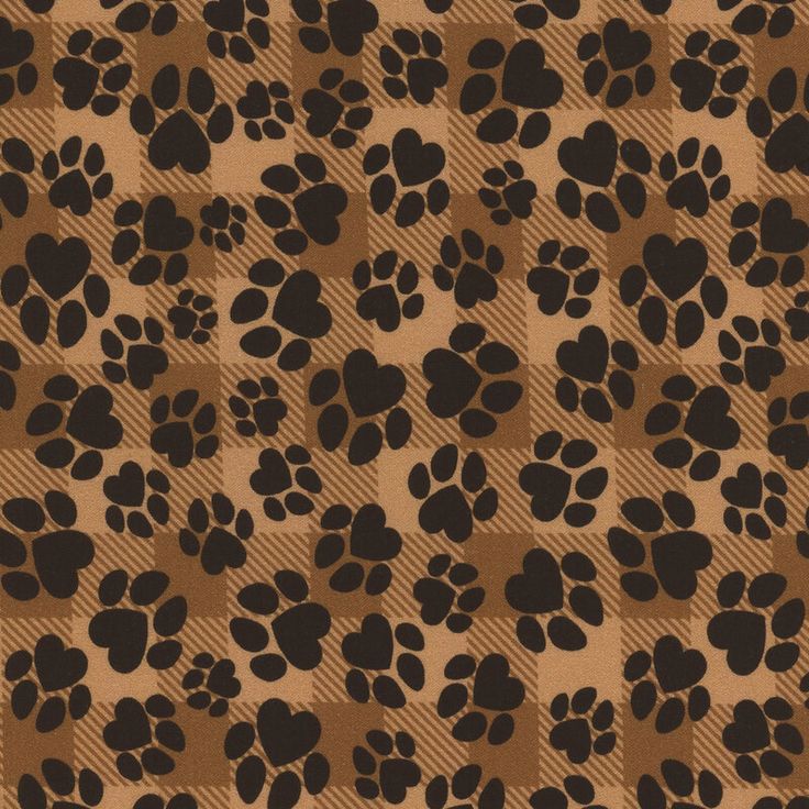 a brown and black animal print pattern with hearts on it's back ground,