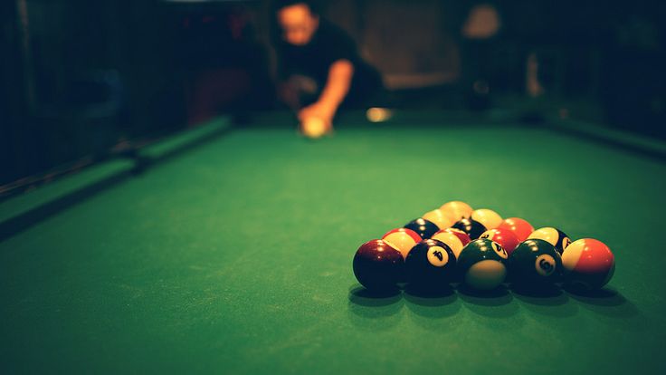 billiards balls lined up on the table with a quote from bob bakso