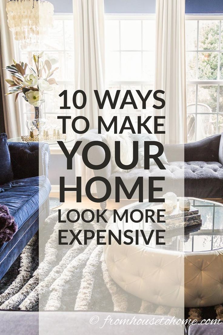 a living room with blue couches and white drapes on the window sill text reads 10 ways to make your home look more expensive