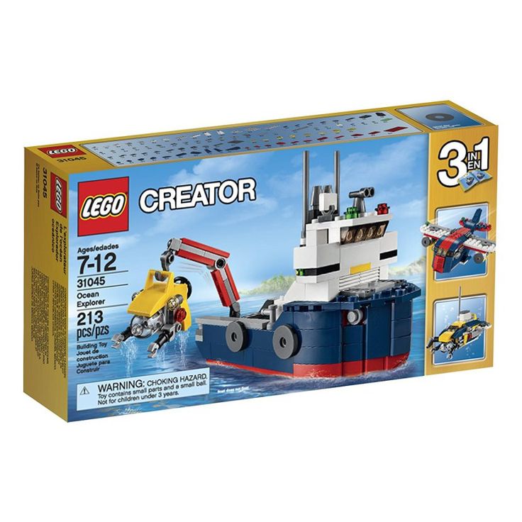 a lego box with a boat and crane in it