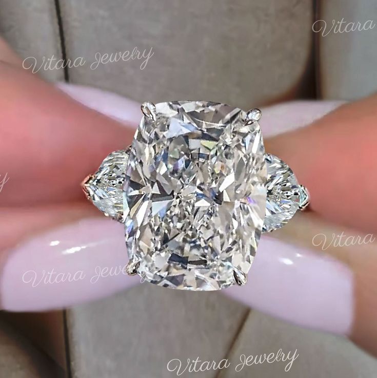 Handmade 19.8 TCW 3 stone Cushion cut moissanite engagement ring,rose gold,celebrity style heart&big huge elongated cushion Three stone moissanite ring → Occasions: Engagement & Wedding DESCRIPTION  -------------------- STYLE                                     :Three stone /hidden halo/ three row pave ●𝐂𝐞𝐧𝐭𝐞𝐫 𝐒𝐭𝐨𝐧𝐞 𝐃𝐞𝐭𝐚𝐢𝐥𝐬 →Stone Type      :Moissanite - High Quality →Main Stone      :Cushion →Size (mm)        :16*12 →Carat Weight   :17  ●𝐌𝐚𝐢𝐧 𝐬𝐭𝐨𝐧𝐞 𝐨𝐩𝐭𝐢𝐨𝐧 𝐢𝐧 ? Luxury Moissanite Wedding Ring With Accent Stones, Luxury Moissanite Wedding And Engagement Ring With Accent Stones, Luxury Moissanite Gemstone Wedding And Engagement, Luxury Diamond White Crystal Wedding Ring, Luxury Brilliant Cut Crystal Engagement Ring, Luxury Diamond White Gemstone Wedding And Engagement, Huge Engagement Rings Benz & Co Diamonds, Luxury Timeless Engagement Diamond Ring, Luxury Large Stone Promise Ring