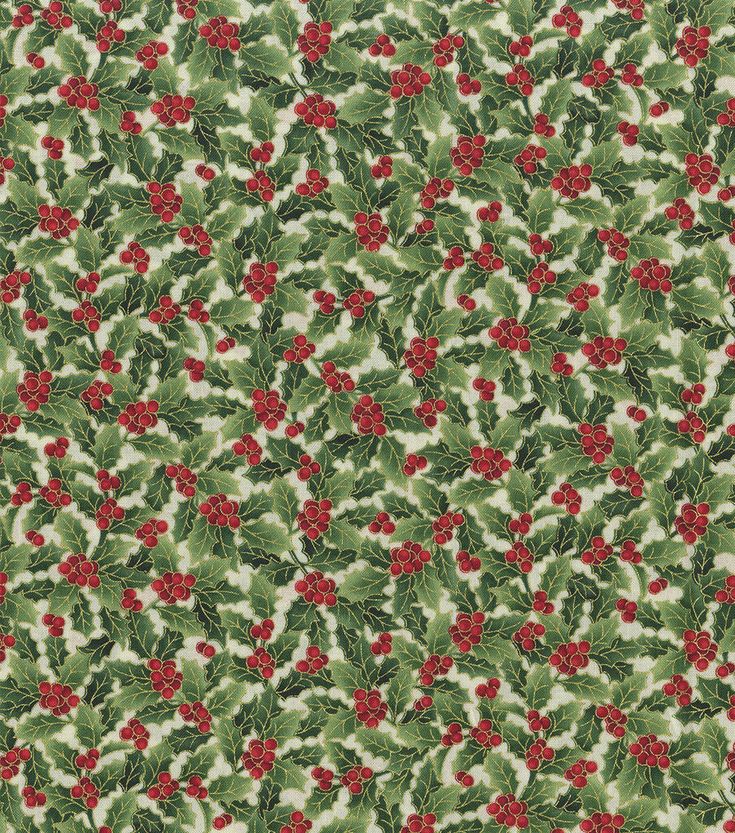 holly leaves and berries on white fabric with red berries in the center, surrounded by green leaves