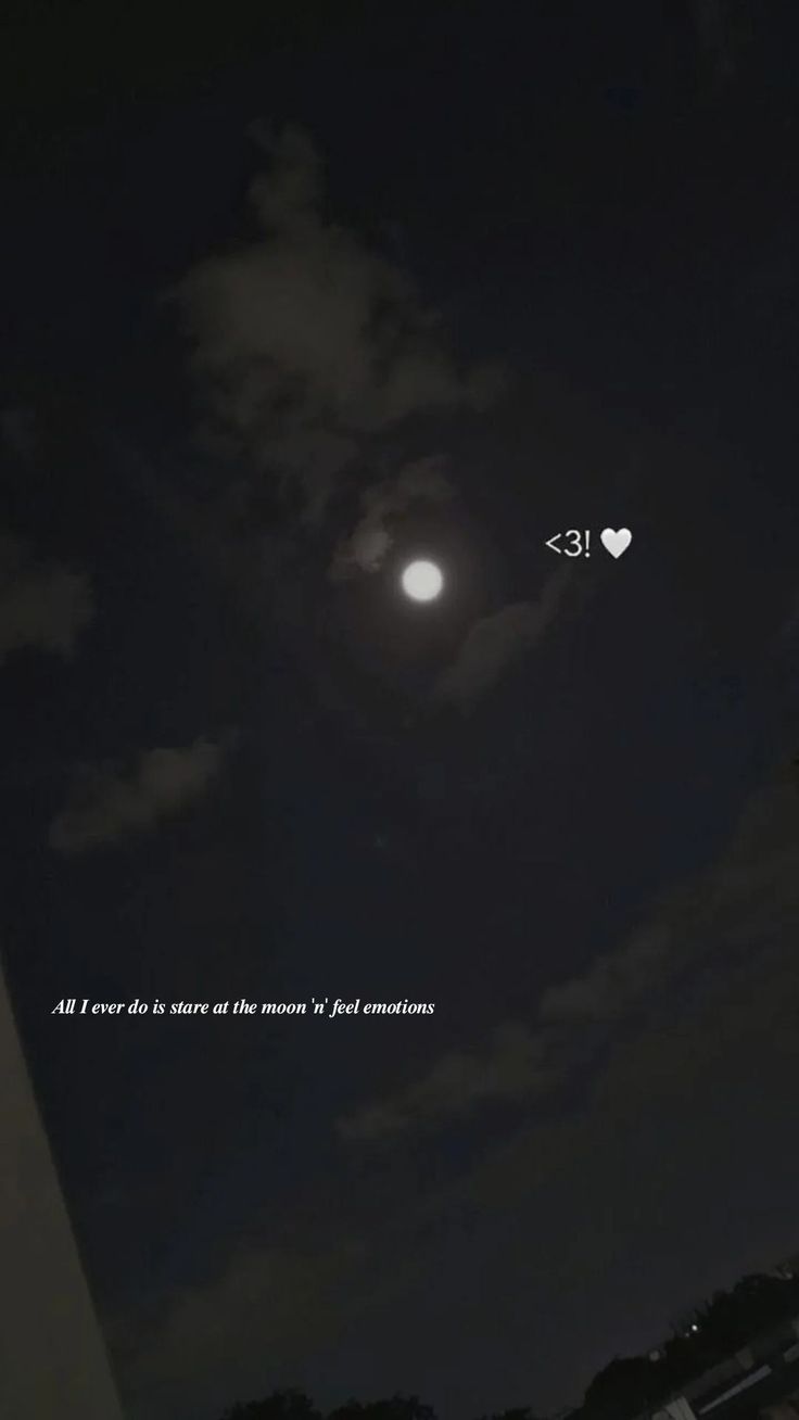 the moon is shining in the night sky