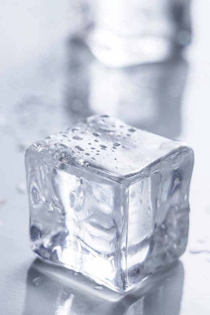 an ice cube sitting on top of a table