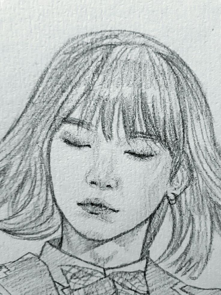 a pencil drawing of a girl with her eyes closed and head tilted to the side