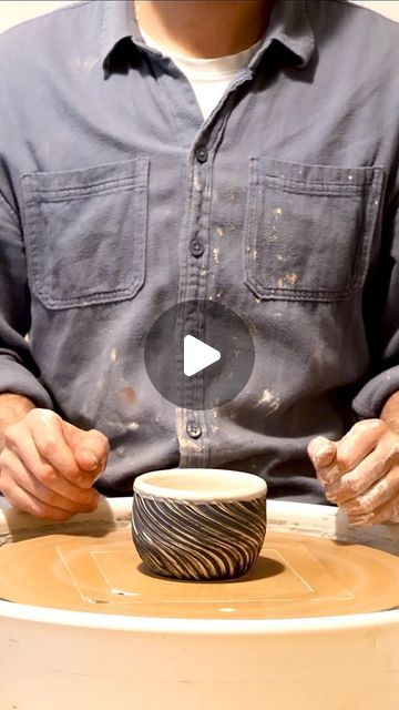 a man is making a bowl out of clay