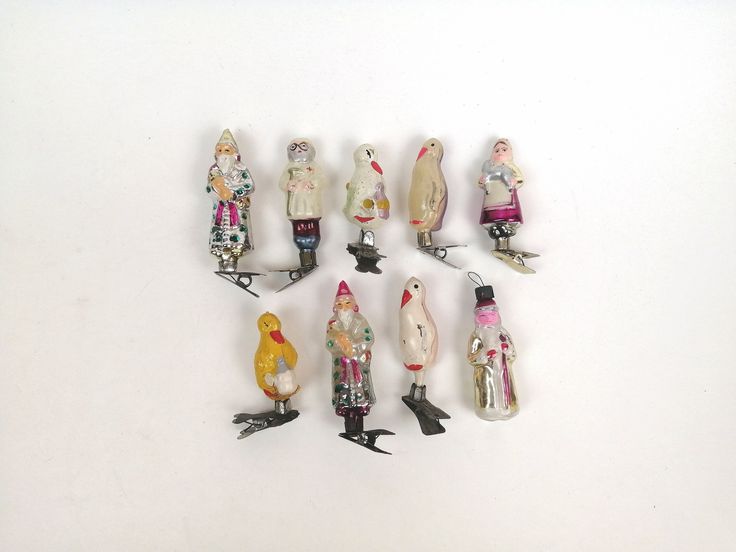 a group of small figurines sitting on top of each other