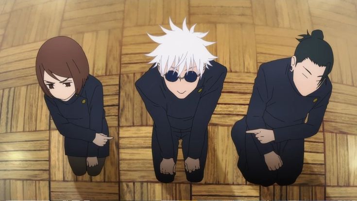 three anime characters are sitting on the floor