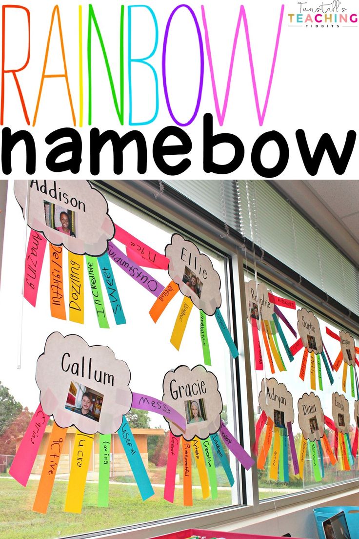 a window with rainbow name tags attached to it