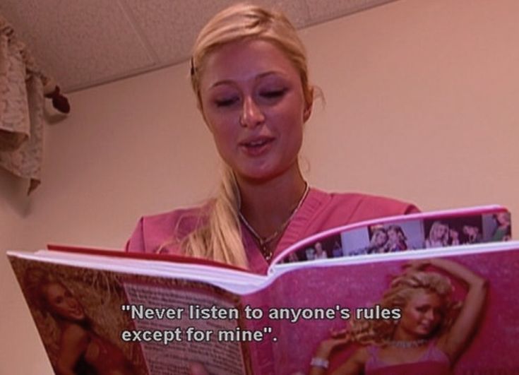 a woman reading a book with a quote on the front and back cover that reads never listen to anyone's rules except for mine