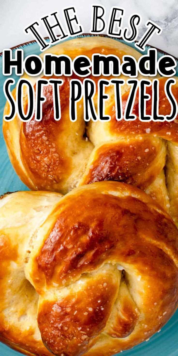 homemade soft pretzels on a blue plate with the words, the best homemade soft pretzels