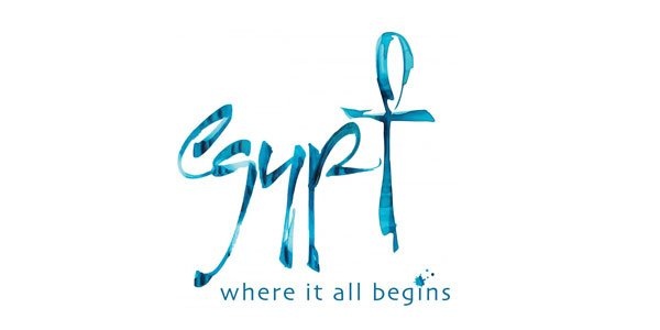 the word spirit is written in blue ink on a white background with an artistic cross