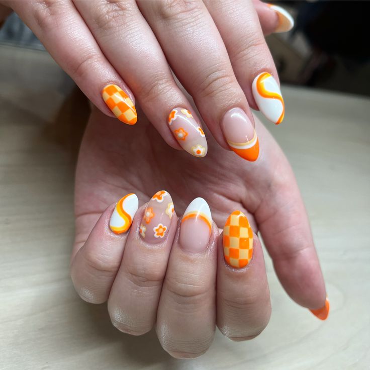 #orange #orangenails #nails #nailsofinstagram #nailsdesign #sunmernails #summernails #summervibes #coatednailsohio #ohiosalons #ohio #nailsoftheday #nailtrends #checkered Cute Orange Nails Design, Short Acrylic Nails Square Checkered, Retro Checkered Nails, Orange And White Checkerboard Nails, Cute Nails Checkered, Orange Retro Nails, Mismatched Nail Designs, Wavy Checkered Nails, Orange Checkered Nails