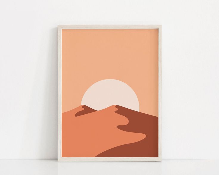 a desert scene with the sun setting in the background