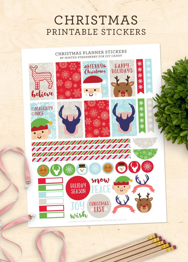 christmas printable stickers on a table