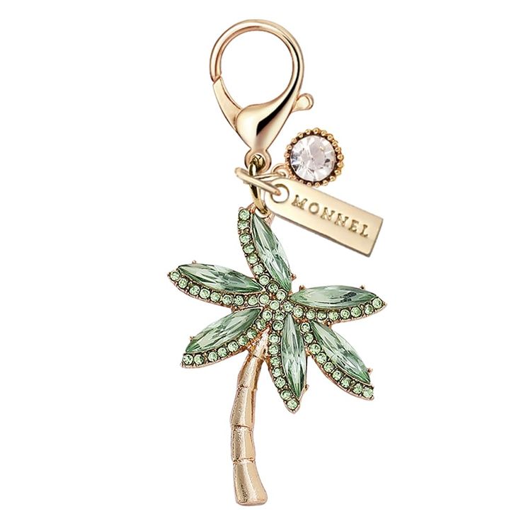 PRICES MAY VARY. 1 Piece Green Crystal Coconut Tree Lobster Clasp Charm packaged in Monnel velvet bag. Measurement: approx.2.9 cm (L) X 0.4 cm (W) X 3.6 cm (H) for the charm and 2.3 cm (H) x 2.2 cm (W) x 0.9 cm (D) for the Lobster Clasp. Materials: Zinc Alloy Metal ,Rhinestone,Enamel Handmade Painted. Good for jewelry making and decoration,such as necklace, keychain, phone plug ,handbags and pets collar. Great Gift for Christmas, Valentine's Day, Graduation Gifts or other special days. This is t Keychain Phone, Necklace Keychain, Phone Plug, Coconut Tree, Bag Green, Green Crystal, Gift For Christmas, Velvet Bag, Green Crystals