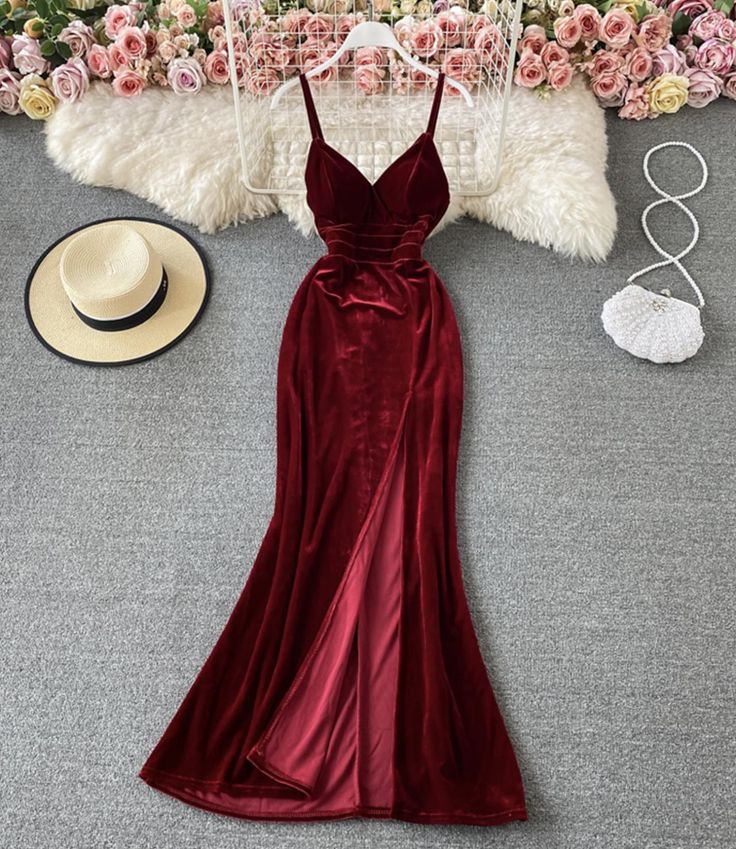 Unleash the allure of classic glamour with this Vintage Velvet Burgundy Gown. The rich, deep hue of burgundy exudes a luxurious warmth, while the plush velvet material provides a tactile delight, ensuring this gown is as sumptuous to the touch as it is to the eye. The fitted bodice with a sweetheart neckline and spaghetti straps offers a timeless and seductive appeal, perfect for an evening of elegance.The gowns silhouette gracefully skims the body, flowing into a gentle flare at the hem that ad Fashion Birthday Party, Velvet Long Dress, Moda Steampunk, Velvet Dress Long, Prom Dress Evening, Birthday Fashion, Burgundy Velvet, Off Shoulder Fashion, Deja Vu