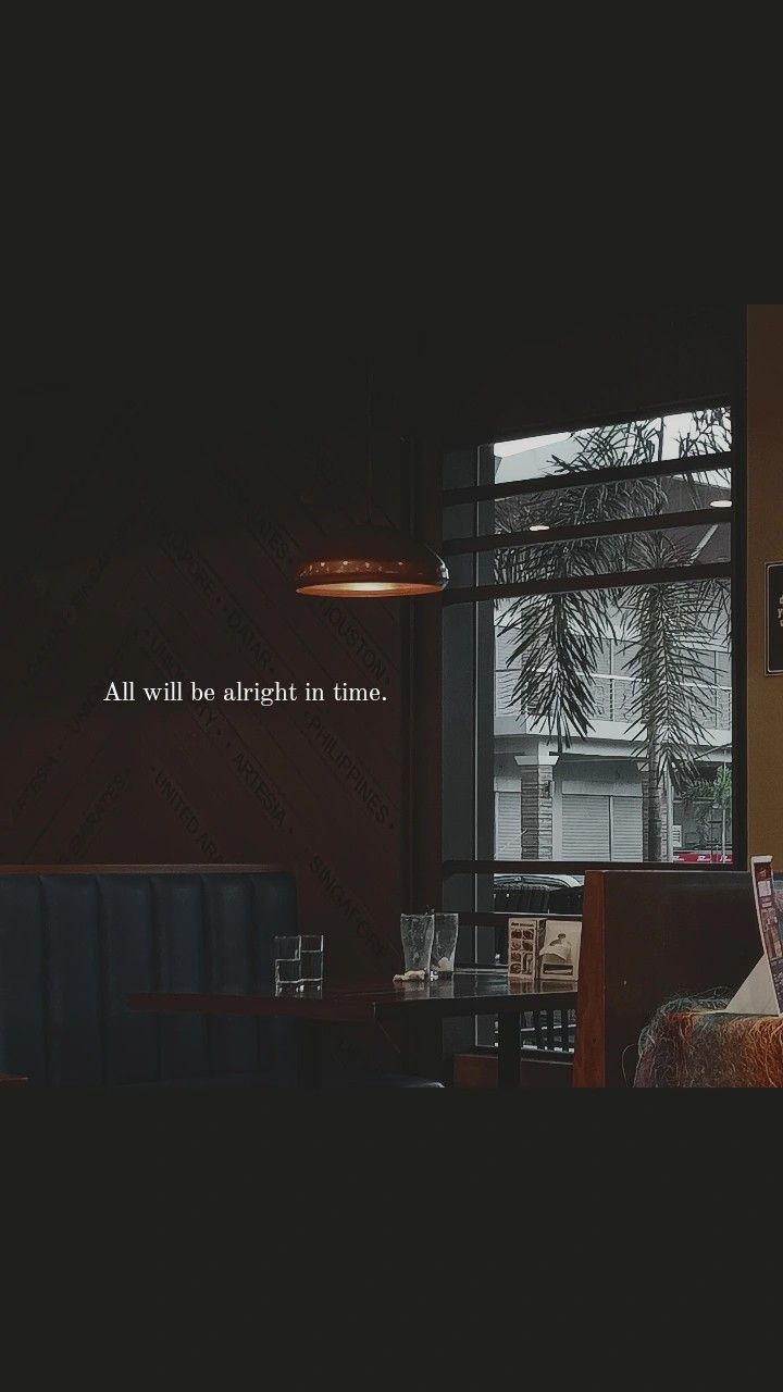 an empty restaurant with the words all will be alright in time