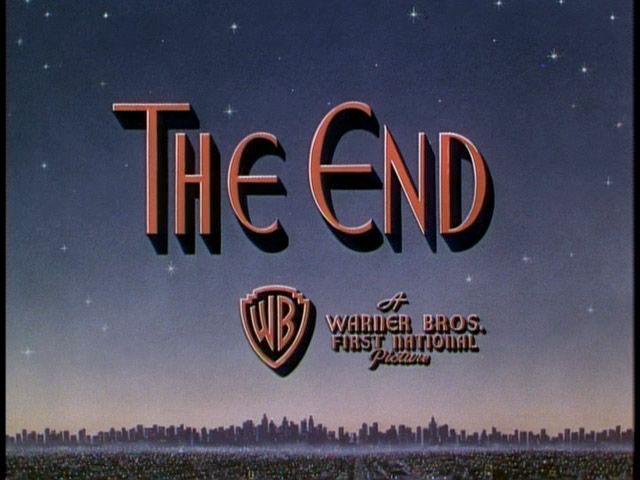 the end logo with an image of a city in the background