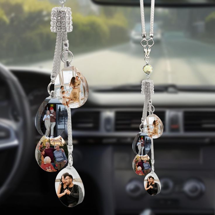 a car dashboard with several pictures hanging from it