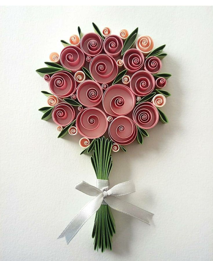 a bouquet of paper flowers on a white background