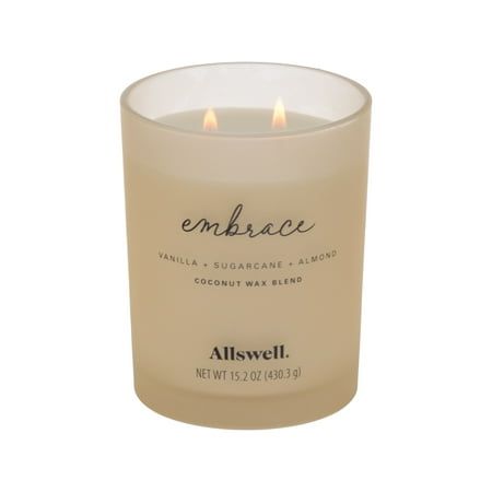 an embre candle with the words embrace on it