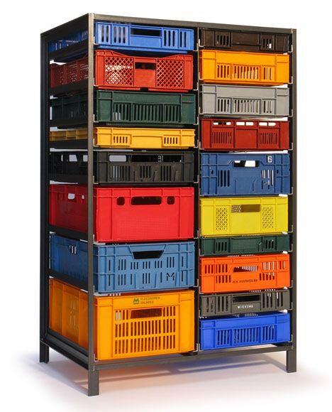 multicolored bins are stacked on top of each other in this shelving unit