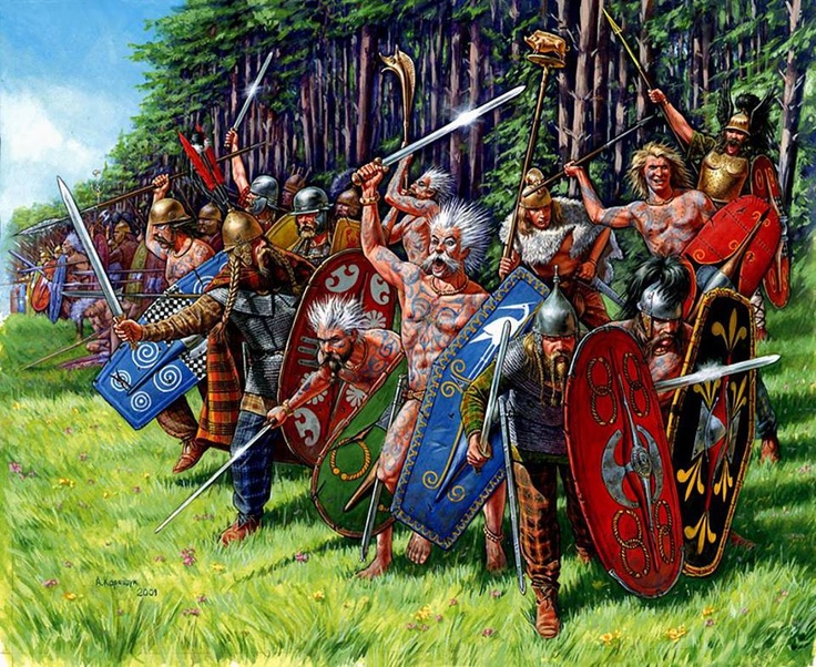 a group of men in armor standing next to each other on a lush green field