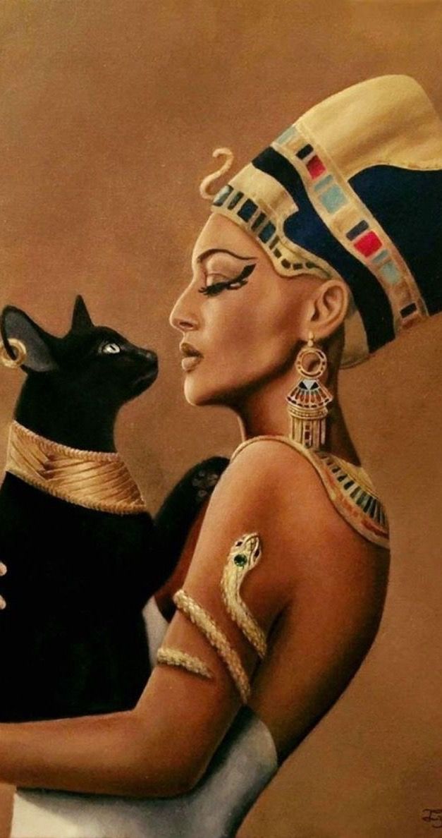 an egyptian woman holding a black cat in her arms