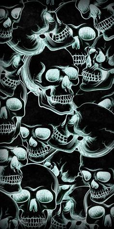 a bunch of skulls that are in the dark with one skull on it's side