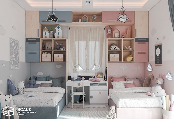 two beds in a room with pink and gray walls