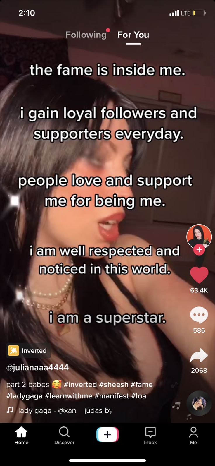 a woman with long black hair is talking on her cell phone and the caption reads, i am a superstar