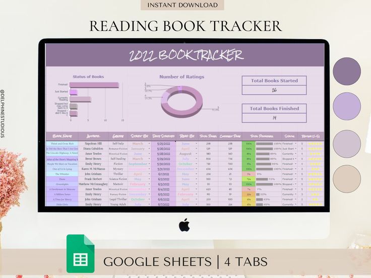 an image of a computer screen with the text reading book tracker on it and a vase full of flowers