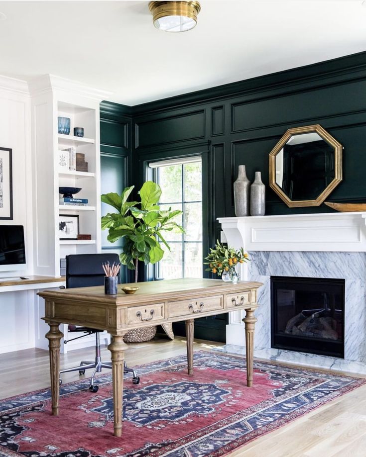 a living room filled with furniture and a fire place