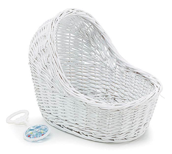 a white wicker basket next to a pacifier