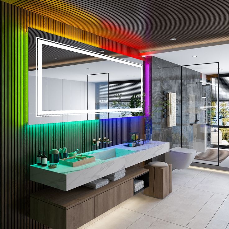 a modern bathroom with multicolored lights on the wall and two sinks in the middle