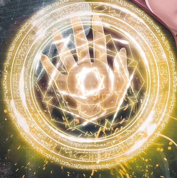 a person with their hand in the center of a circle that is surrounded by symbols